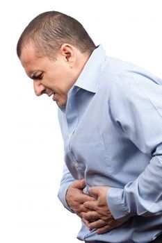 man suffering from rib pain